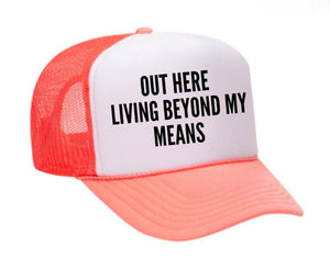 Out Here Living Beyond My Means Trucker Hat: Hunter Green/White