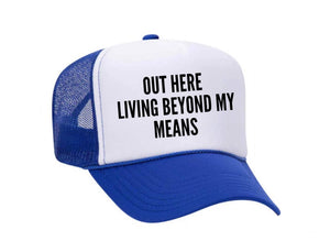 Out Here Living Beyond My Means Trucker Hat: Hunter Green/White