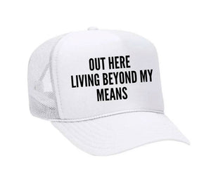 Out Here Living Beyond My Means Trucker Hat: Hunter Green/White