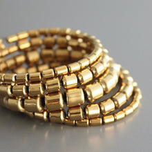 Load image into Gallery viewer, Gold plated hematite wrap bracelet