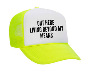 Out Here Living Beyond My Means Trucker Hat: Hunter Green/White