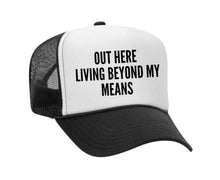 Load image into Gallery viewer, Out Here Living Beyond My Means Trucker Hat: Hunter Green/White