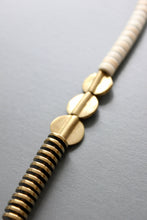 Load image into Gallery viewer, Gold hematite and white disc necklace