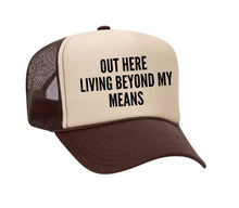 Load image into Gallery viewer, Out Here Living Beyond My Means Trucker Hat: Hunter Green/White