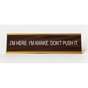 I'm Here. I'm Awake. Don't Push It. Nameplate